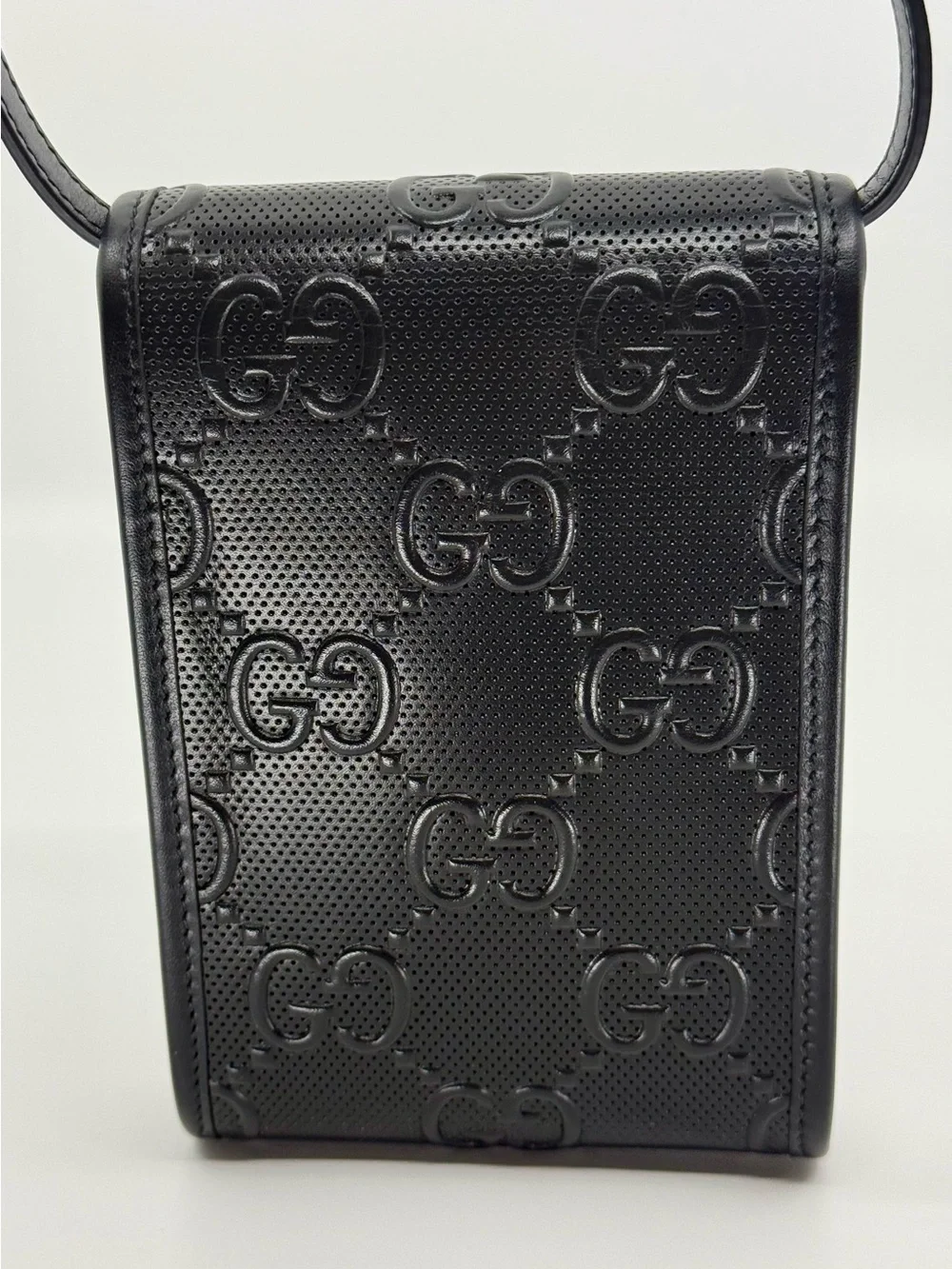 Gucci Black Embossed GG Leather Phone Bag